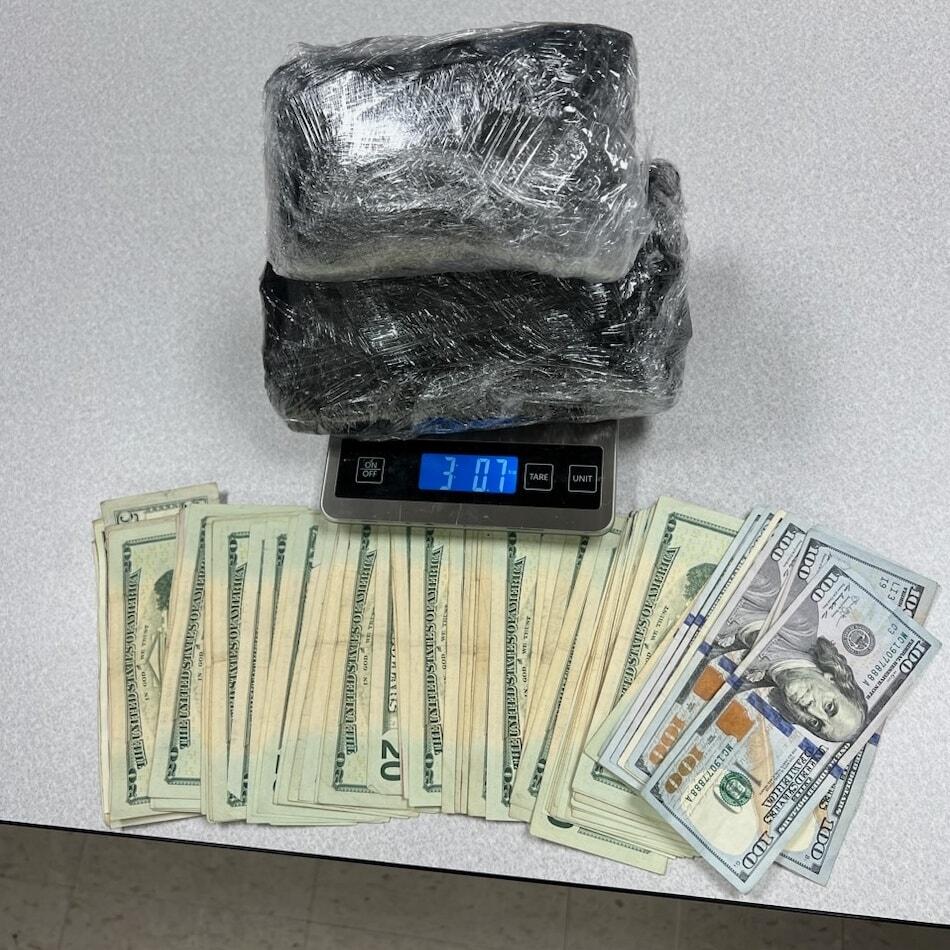 Seized Drugs on scale and cash