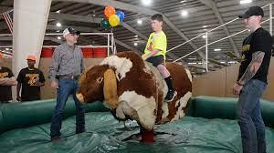 Youth on mechanical bull