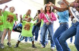 Rodeo queen with students