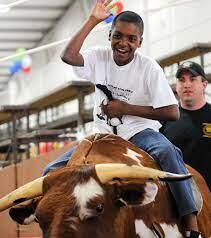 Boy on mechanical bull