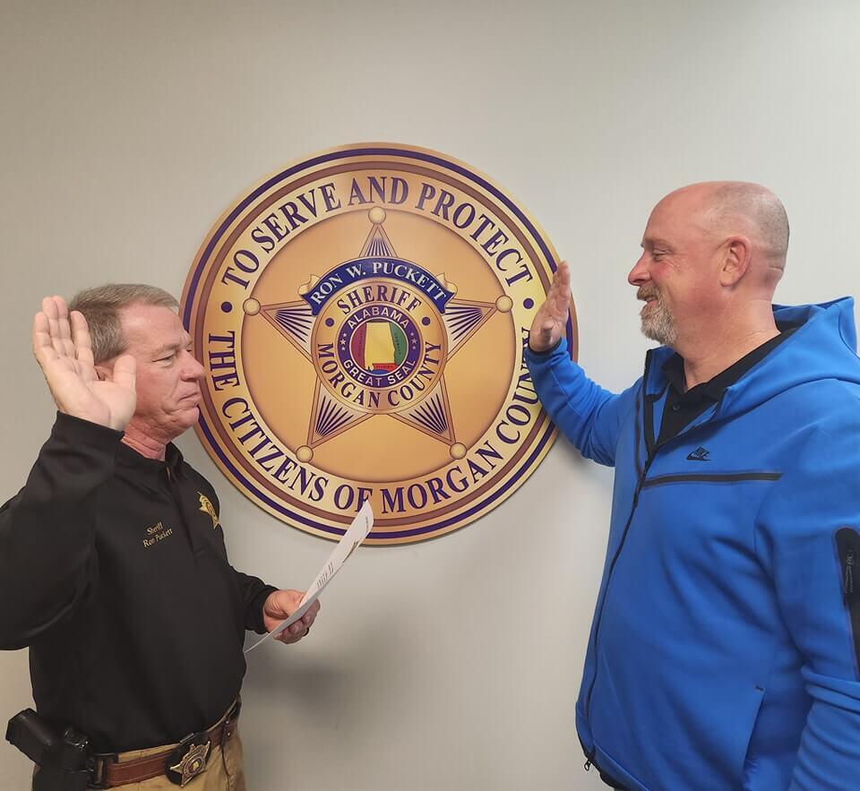 Sheriff Puckett swearing in Deputy Royals