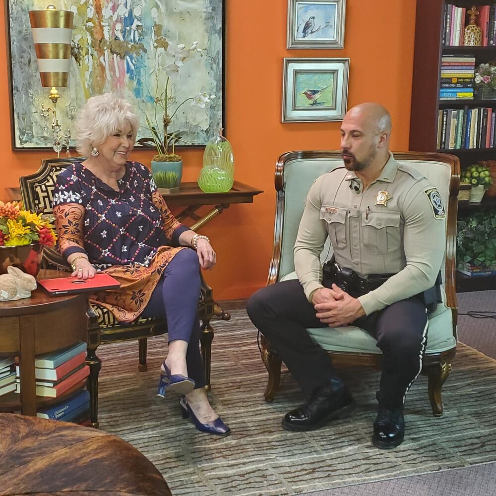 Lt. Fields on set of local TV show