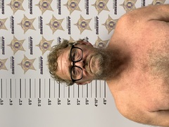 Mugshot of RUSSELL, TOMMY PAUL