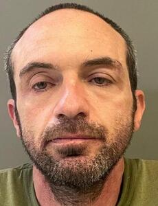 Mugshot of HUGHES, JONATHAN RAY