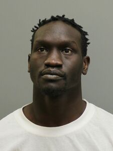 Mugshot of YUGUSUK, KHAMIS ZAKARIA